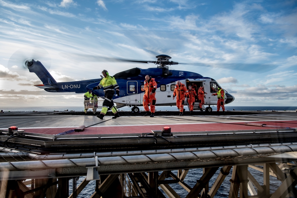 Offshore workers on offshore helicopter deck. photo